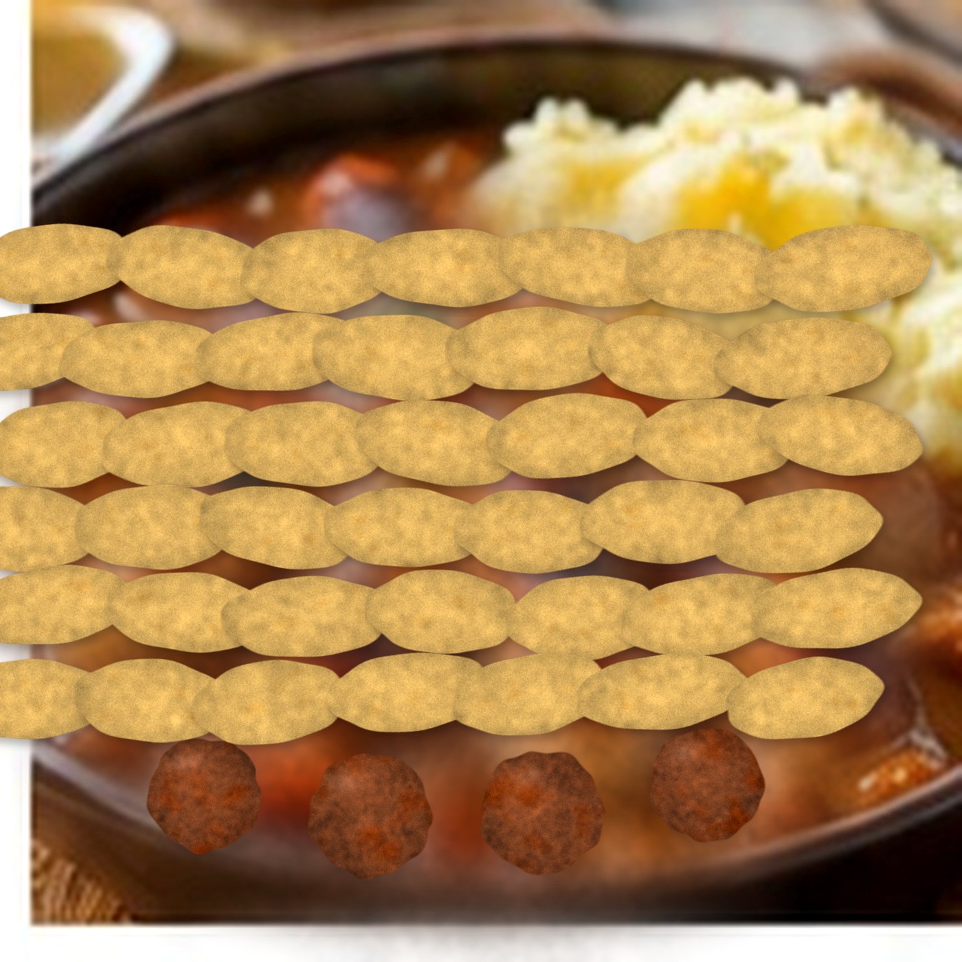 Meatball hotpot with rich gravy and golden sliced potato topping