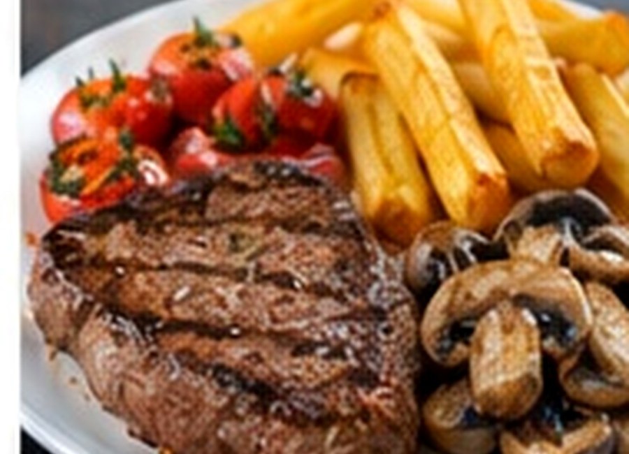 Sirloin steak with chips, mushrooms and roasted tomato