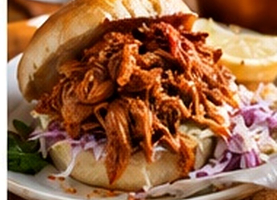 Pulled pork in a soft bread roll with crunchy slaw