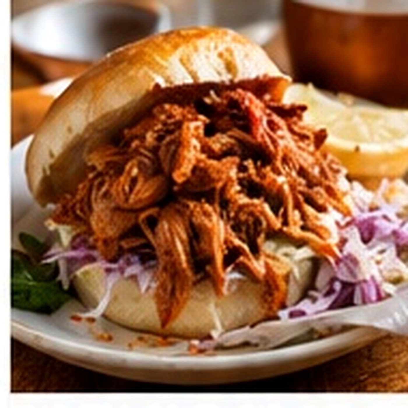 Pulled pork in a soft bread roll with crunchy slaw