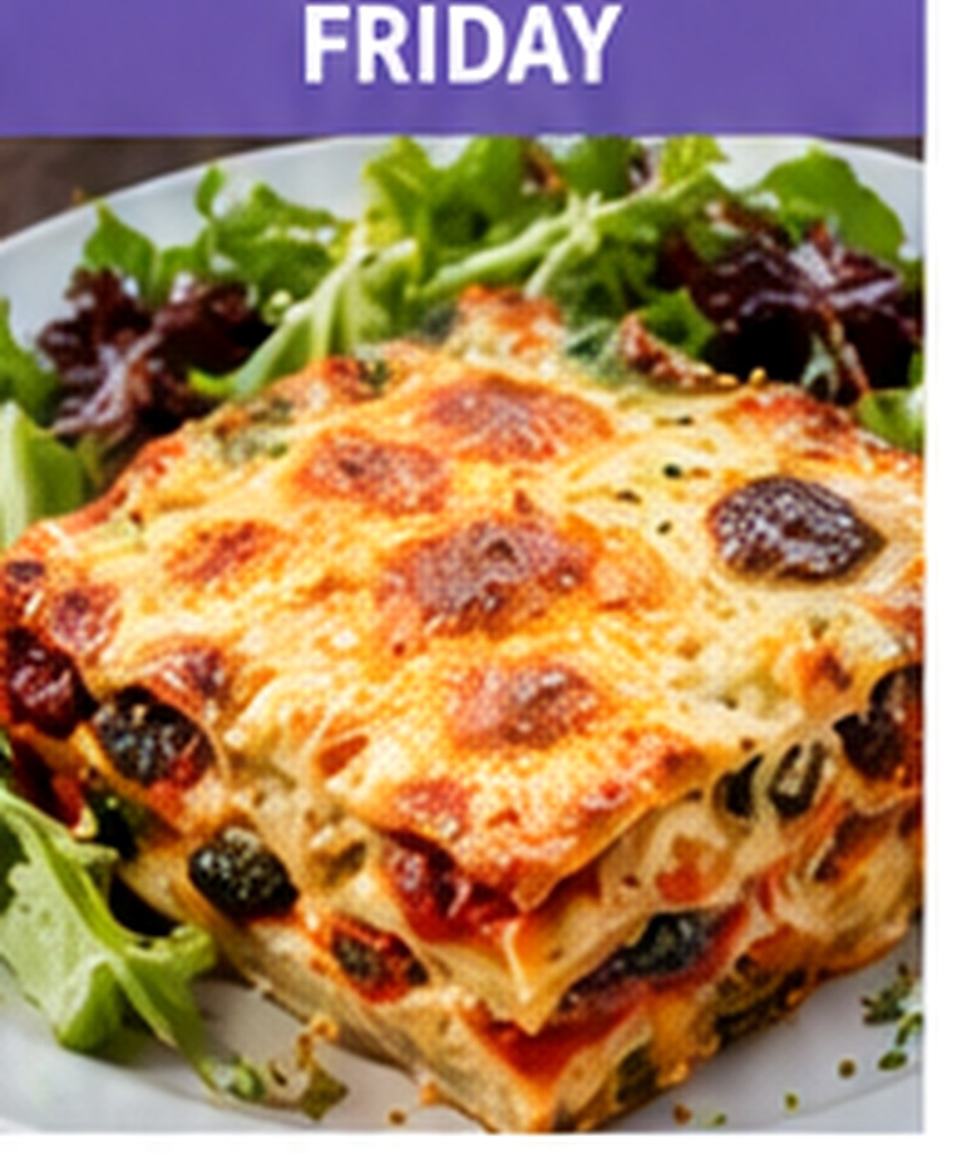 Vegetable lasagne with a golden cheese topping and salad